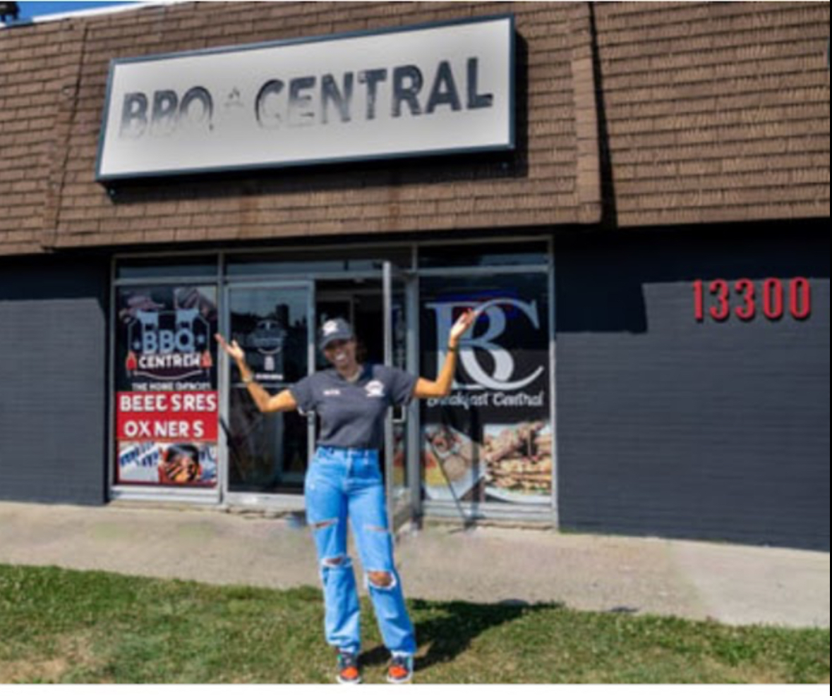 BBQ Central owner Denita Ramsey standing proudly outside her Detroit restaurant